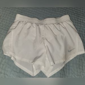 NIKE Ladies Dri•Fit Athletic Shorts - medium